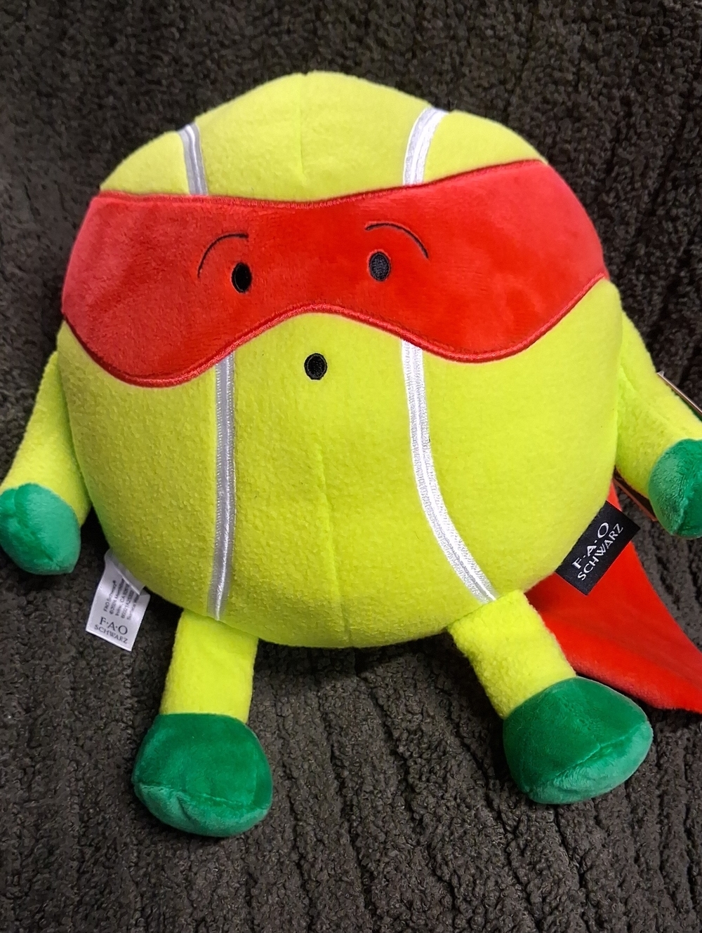 FAO Schwarz Plush Superhero Tennis Ball - Yellow, Red & Green